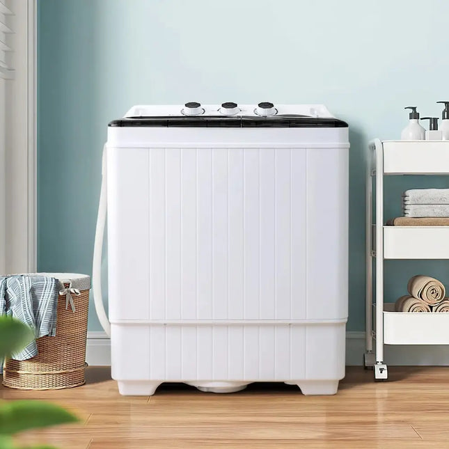 Costway portable twin tub washing machine in white with black top and control knobs in a modern laundry room