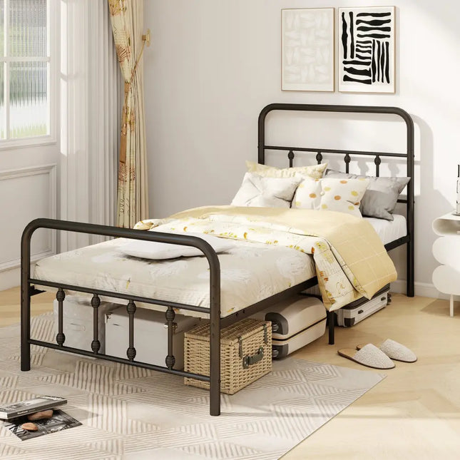 Metal bed frame with mattress and bedding in a bedroom setting.