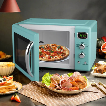 Costway 0.9 Cu.ft retro green countertop microwave oven with digital display and compact design for space-saving kitchen use.