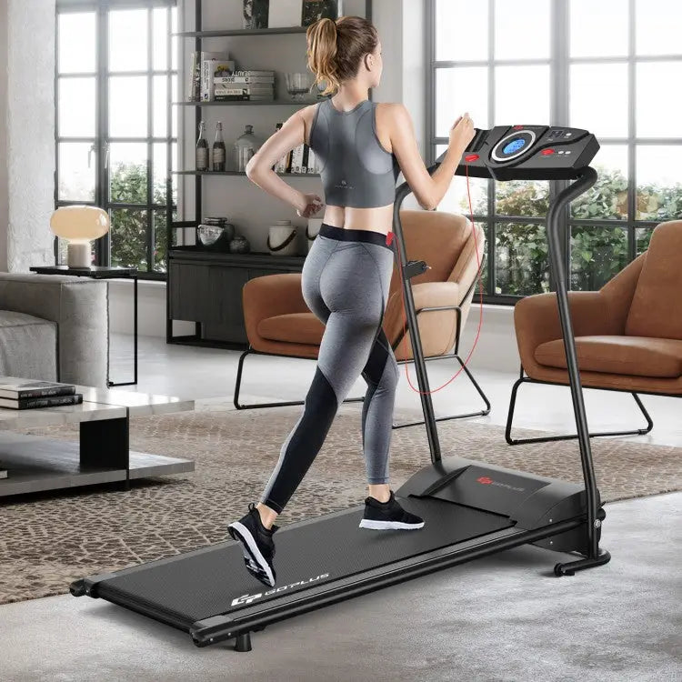Woman using a treadmill in a modern living room.