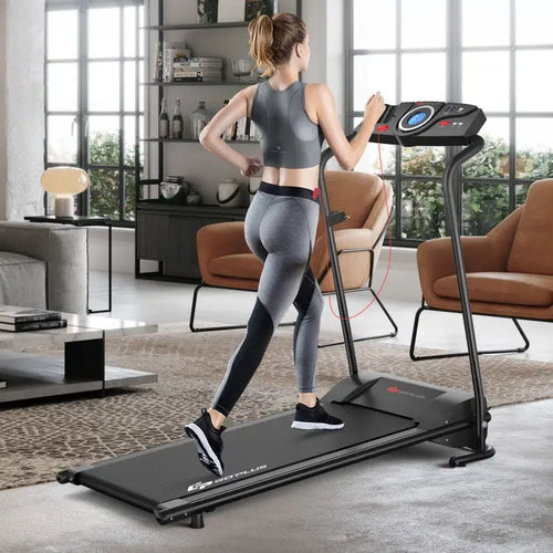 Woman using a treadmill in a modern living room.