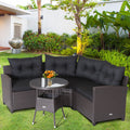 Ensemble de 4 meubles de patio en rotin avec canapé rembourré et table en verre – Noir