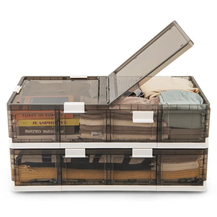 Stackable storage bins with transparent lids on a white background