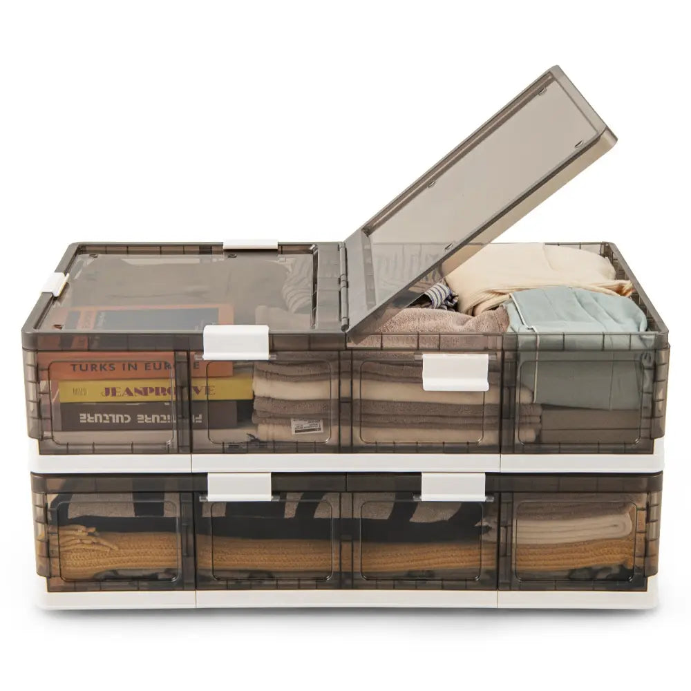 Stackable storage bins with transparent lids on a white background