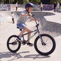 20 Inch Trick Bicycle with 360 Degree Steering and Adjustable Seat for Kids and Teens-Black - Black - Kids Bike