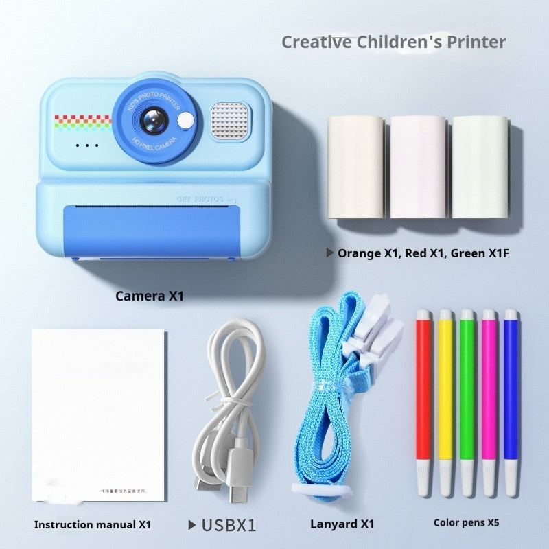 Children's printer with camera, lanyard, color pens, and USB cable on a light blue background