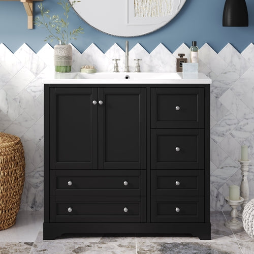 Black bathroom vanity with white countertop against a marble wall.