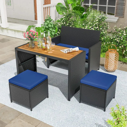 4 Piece Outdoor Dining Set with Wood Topped Dining Table Rattan Loveseat Chair and 2 Ottomans-Navy - Navy - Patio
