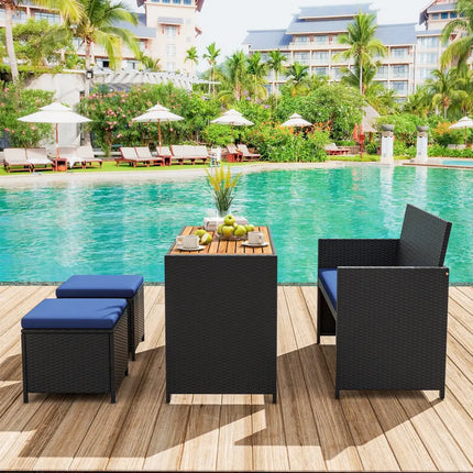 4 Piece Outdoor Dining Set with Wood Topped Dining Table Rattan Loveseat Chair and 2 Ottomans-Navy - Navy - Patio