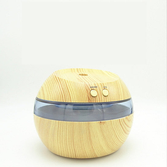Wooden-textured round humidifier on a white background