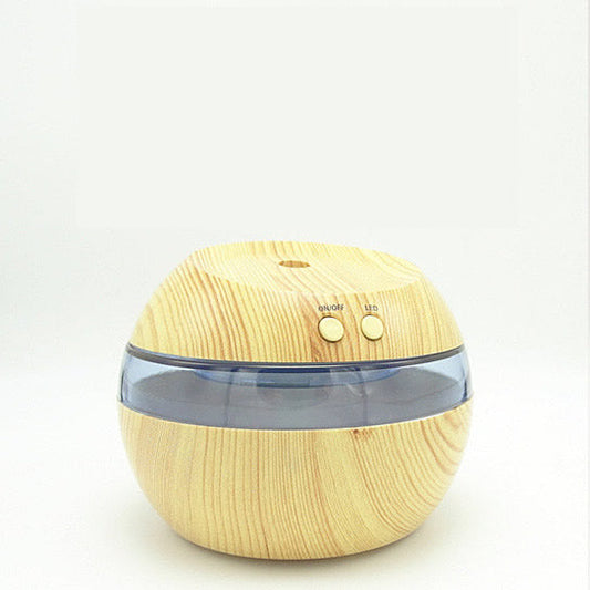 Wooden-textured round humidifier on a white background