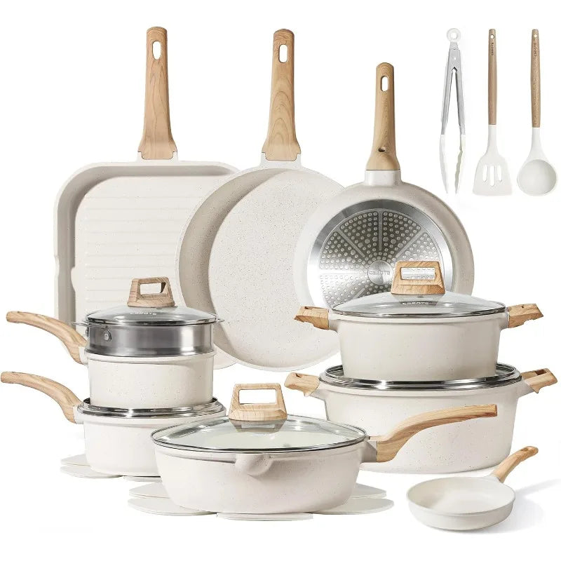 Set of ceramic cookware with wooden handles on a white background