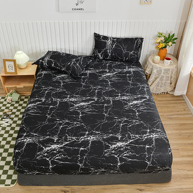 Black marble patterned bedding set on a bed in a bedroom.