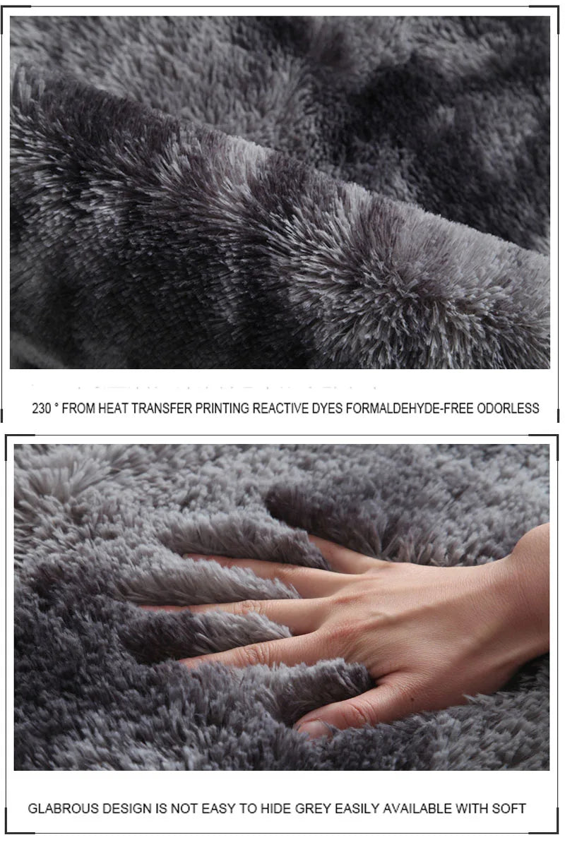 Gray textured fabric with a hand touching it, highlighting softness and texture.