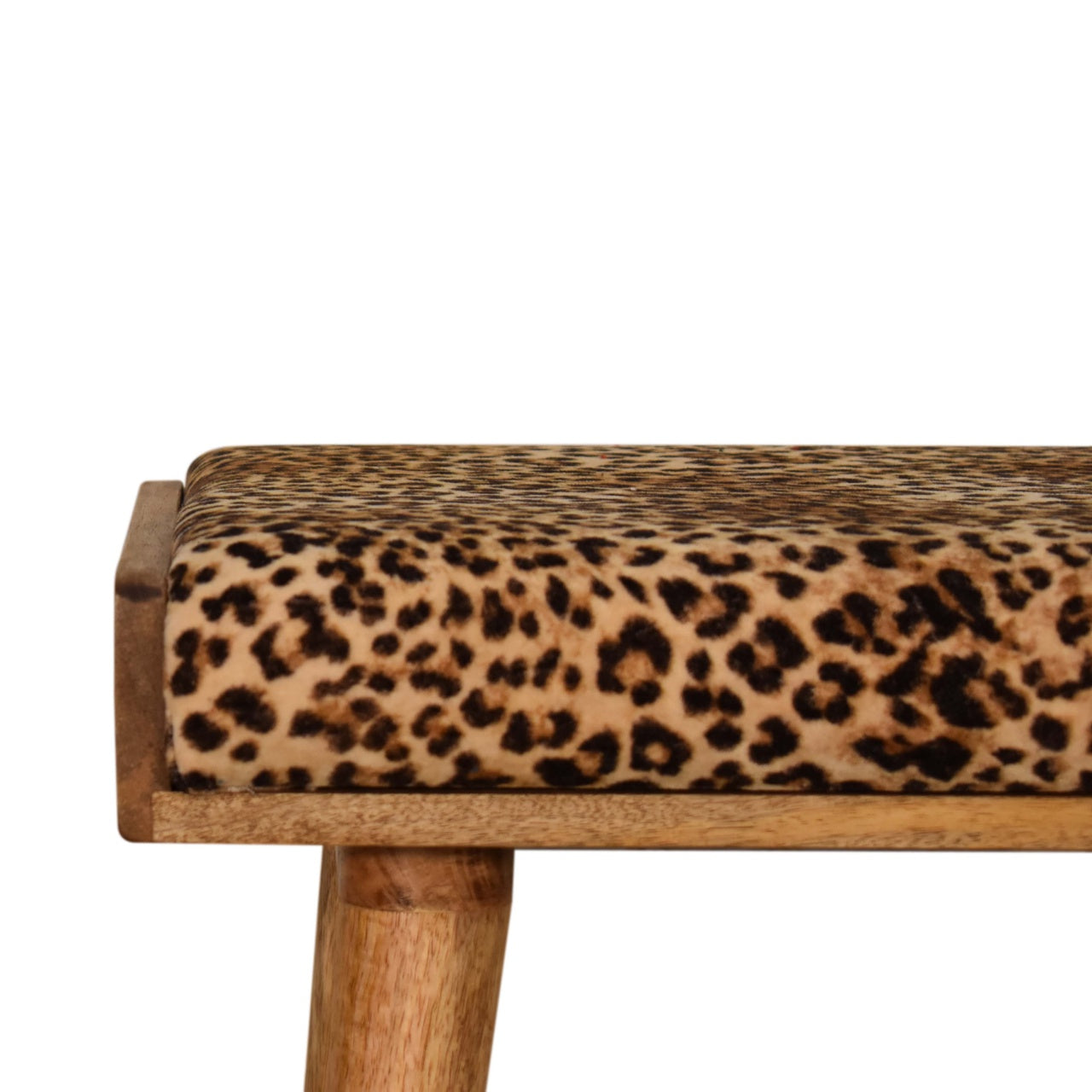 Leopard Velvet Tray Style Footstool with upholstered animal print top and solid mango wood legs. Close up view 