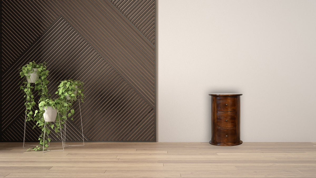 Round 3 Drawer Chestnut Drum Chest made from solid mango wood with shiny knobs on drawers. Full view in a living space
