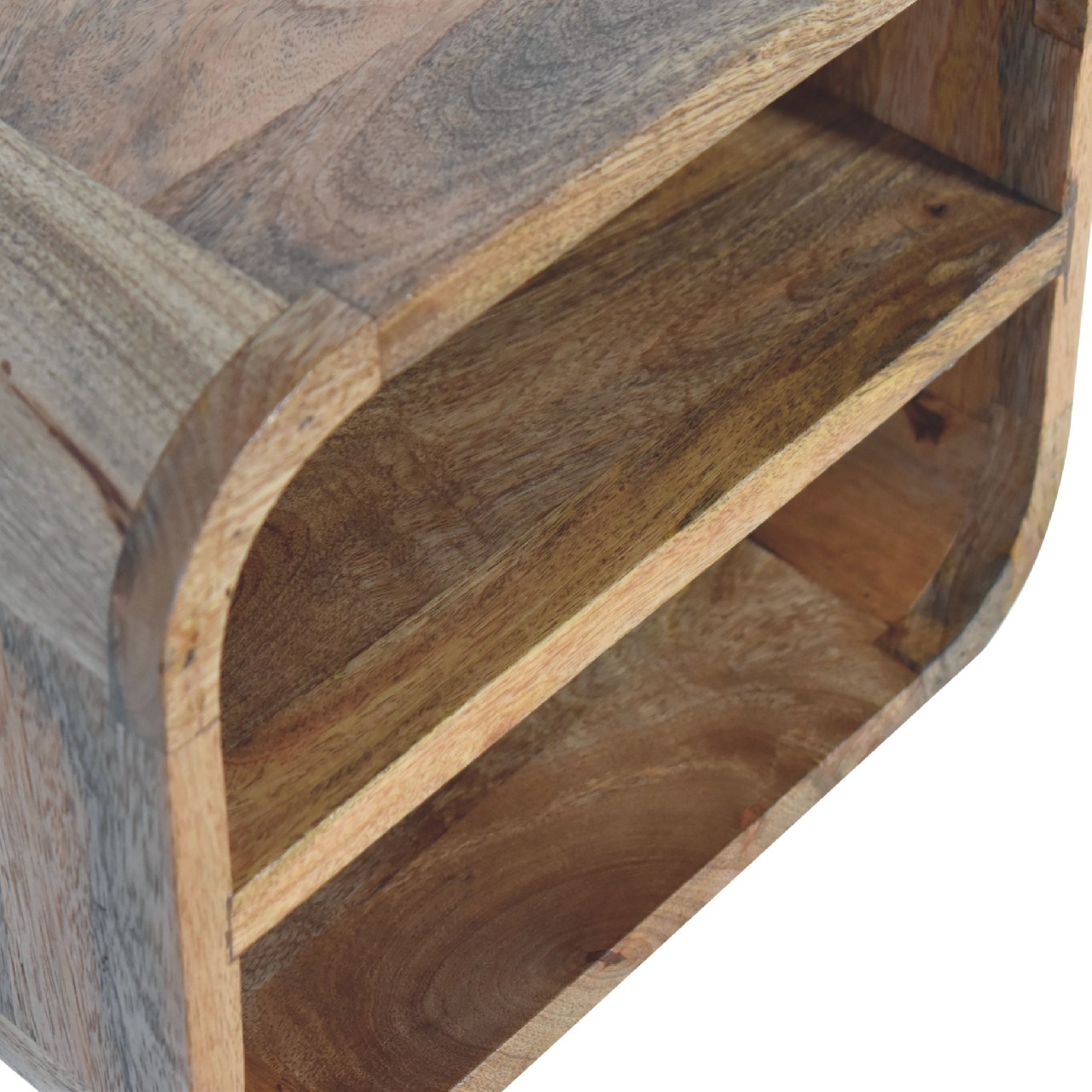 Oak-ish floating open curve nightstand with 2 open shelves. Wall-mounted  and solid mango wood. Curved edge view.