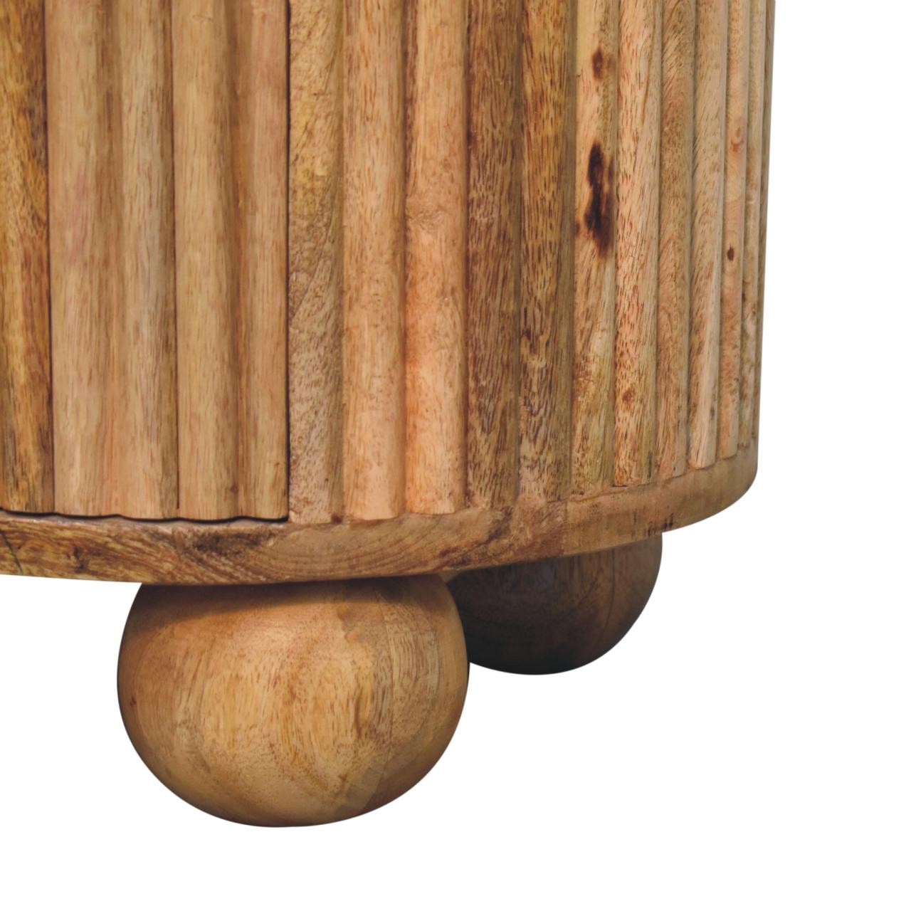 Soba Ball 3-Drawer Bedside Table made from solid mango wood with oak-ish finish and four ball feet. Ball foot view