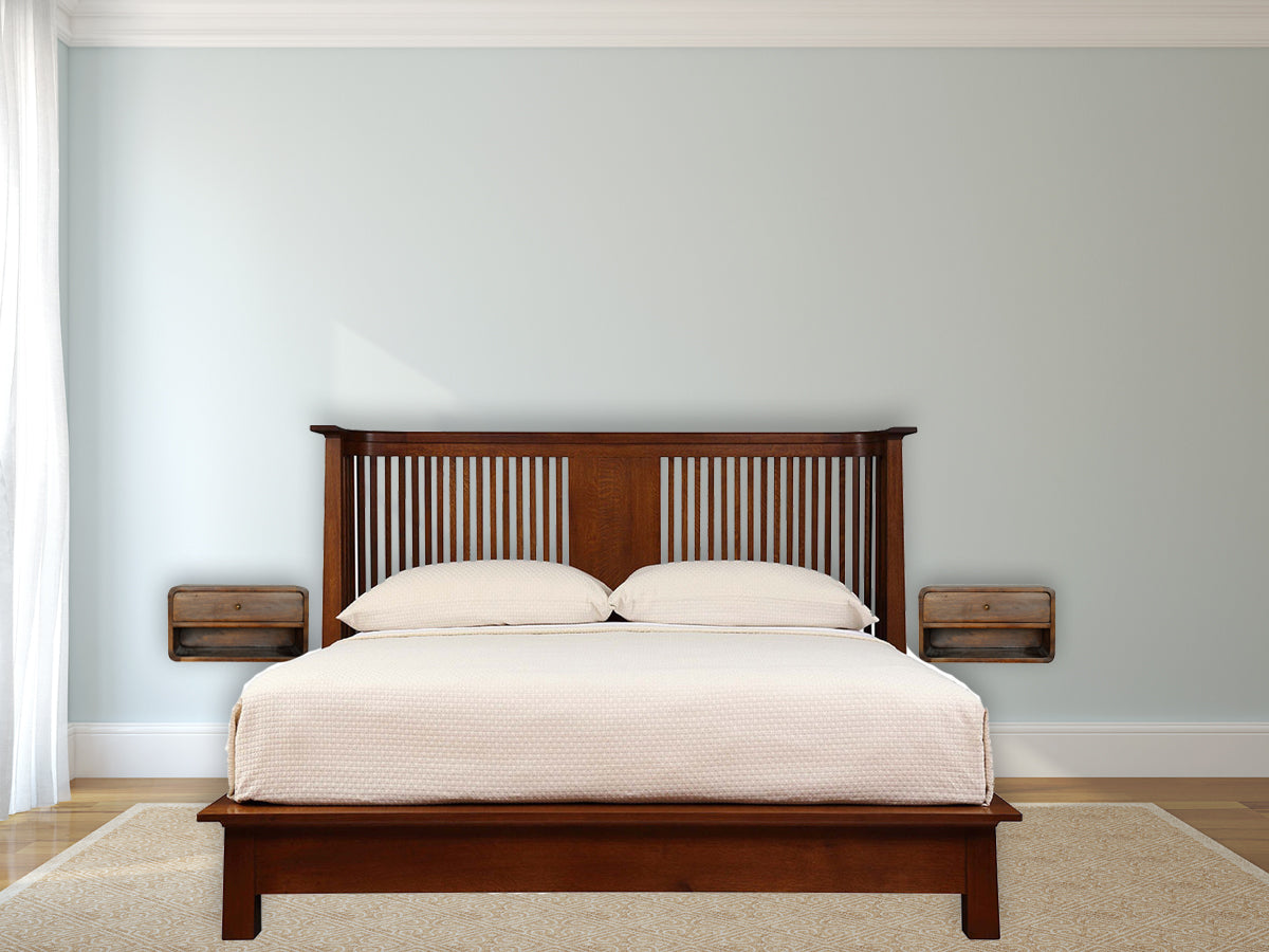 Floating chestnut nightstand with curved edges, wall-mounted modern design. Nightstands beside a bed in a bedroom.