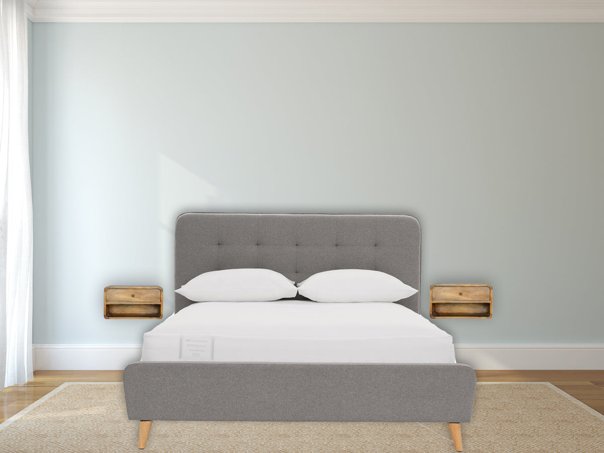 Floating Curve Open Slot Nightstand with one drawer and open shelf, made from solid mango wood. Two wall mounted nightstand by bedside.