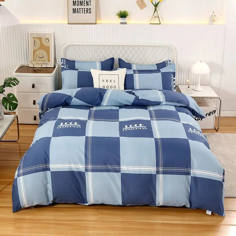 Blue checkered bedding set on a bed in a bedroom with decor elements.