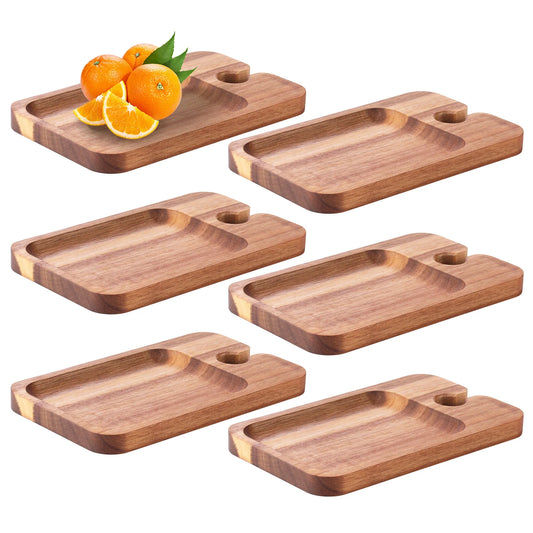 Set of six wooden trays with a small bunch of oranges on a white background
