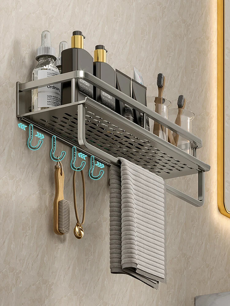 Bathroom shelf with toiletries and grooming tools on a beige wall.