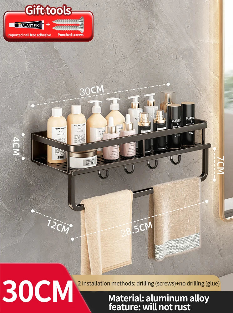 Bathroom shelf with toiletries and towel holder on a gray wall background