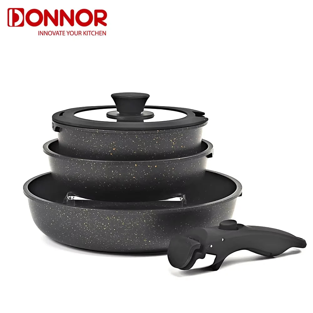 Set of black cookware with speckled pattern and DONNOR branding on a white background