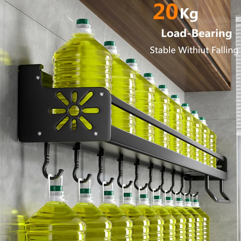 Wall-mounted bottle holder with multiple bottles on a wall, showcasing its load-bearing capacity.