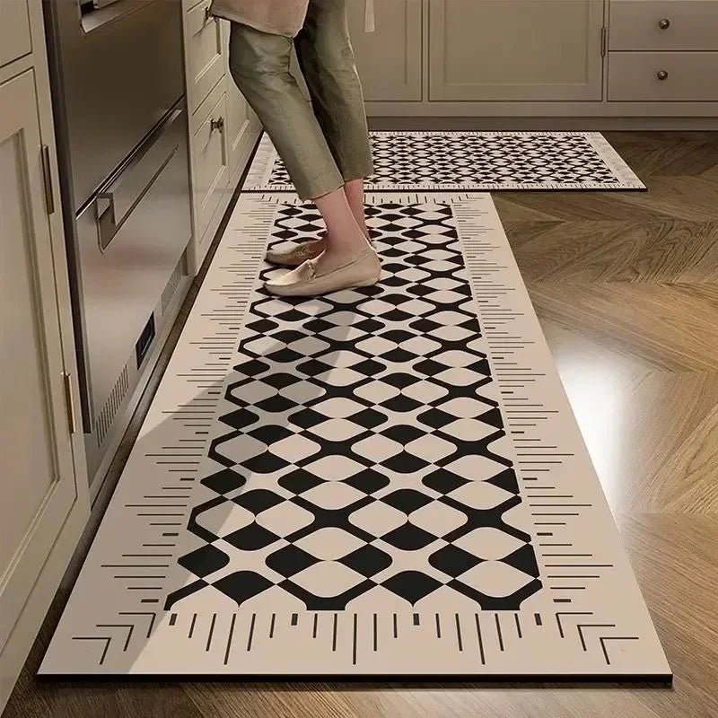Person walking on a patterned rug in a kitchen