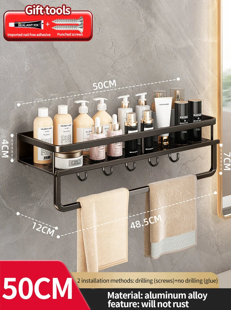 Bathroom shelf with hooks holding toiletries on a gray wall.