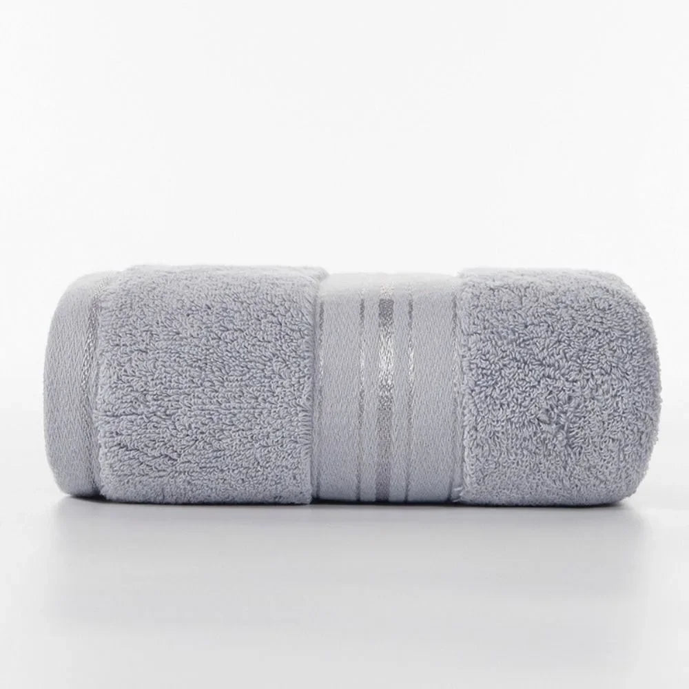 Gray towel with a striped pattern on a white background