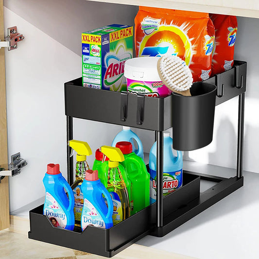 Black under-cabinet organizer with cleaning supplies inside a kitchen.