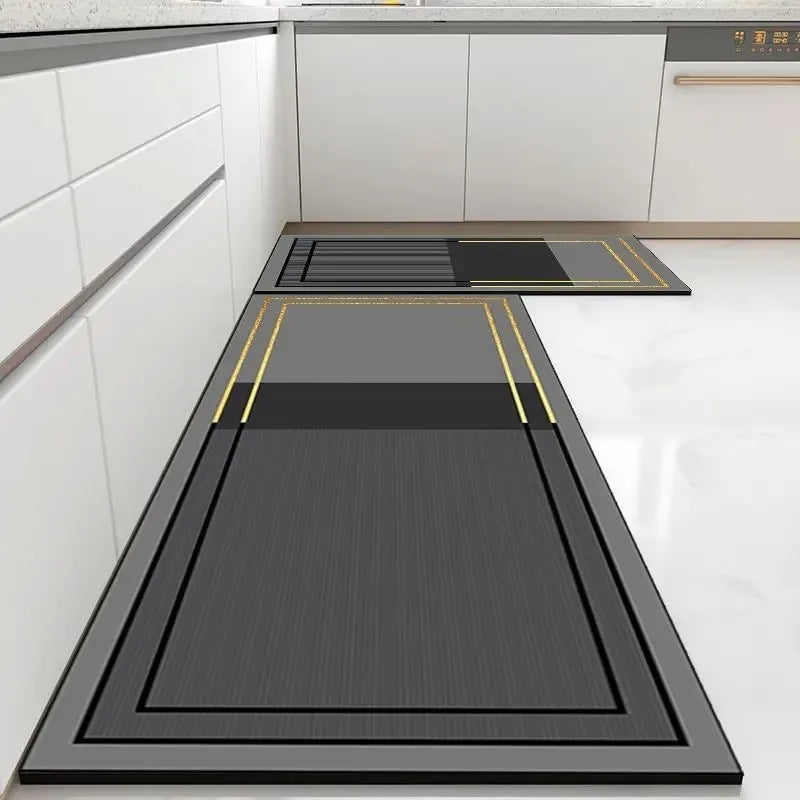 Black kitchen mat with yellow accents on a white floor