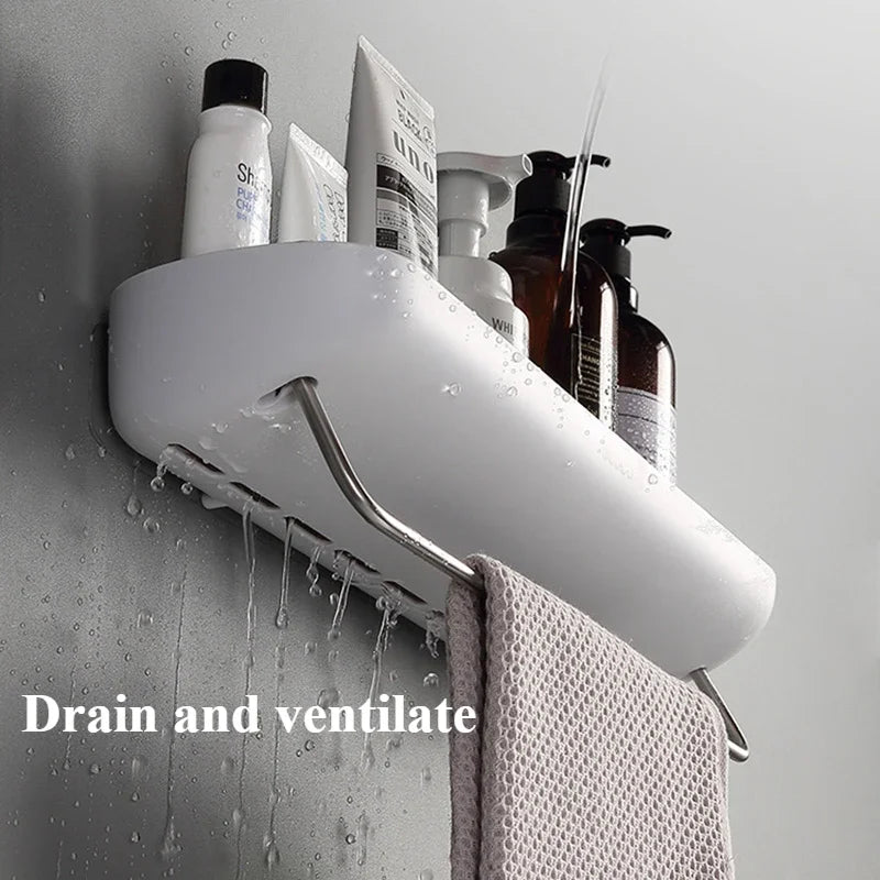 White corner shelf with bath products and towel on a gray wall, with text 'Drain and ventilate'.