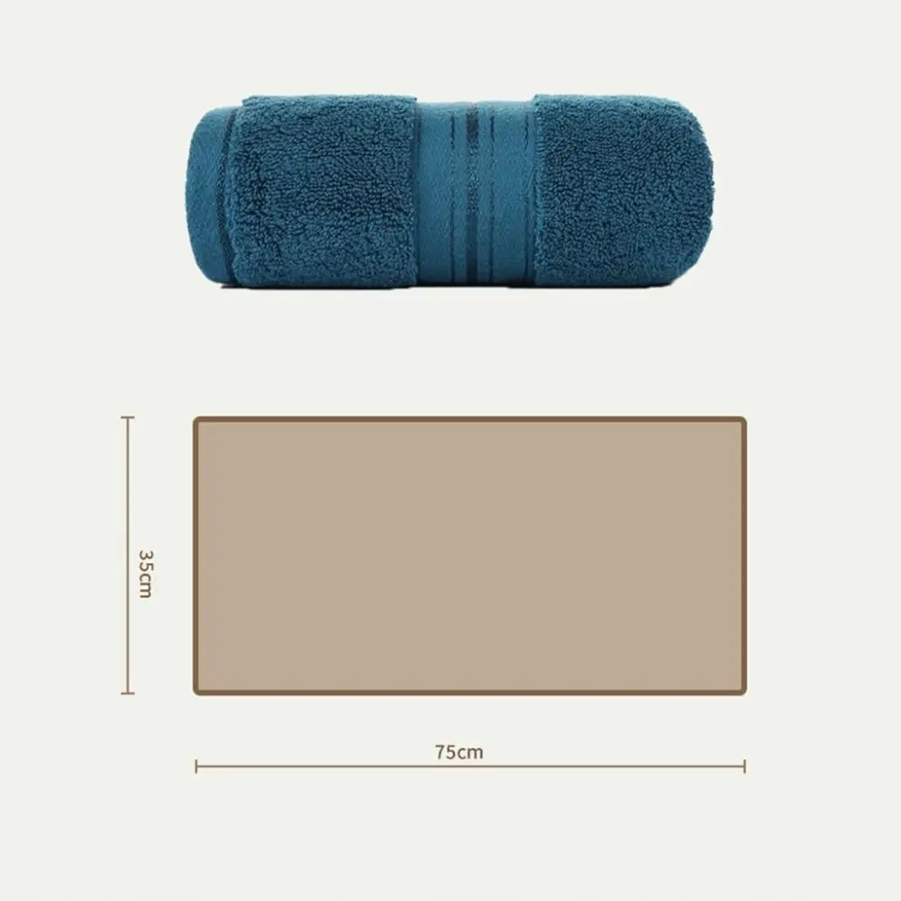 Blue towel rolled up on a beige mat with dimensions indicated