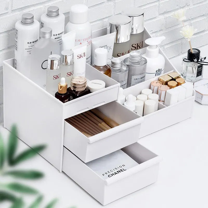 White cosmetic organizer with skincare products on a light gray surface.