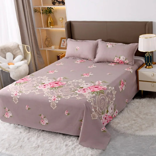 Floral patterned bedspread on a bed in a bedroom setting