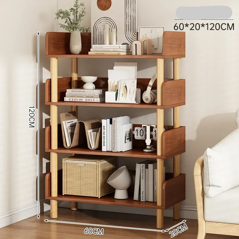 Wooden shelf with books and decor items against a white wall