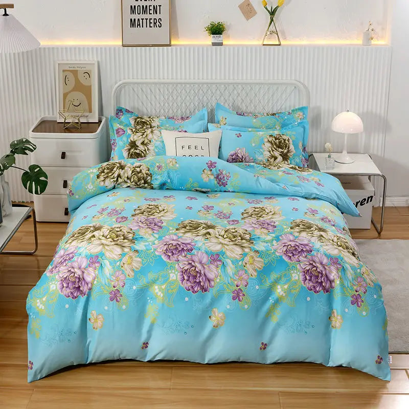 Floral bedding set on a bed in a bedroom with decor elements.
