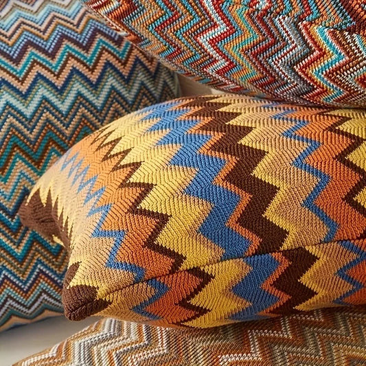 Colorful zigzag patterned cushions on a sofa