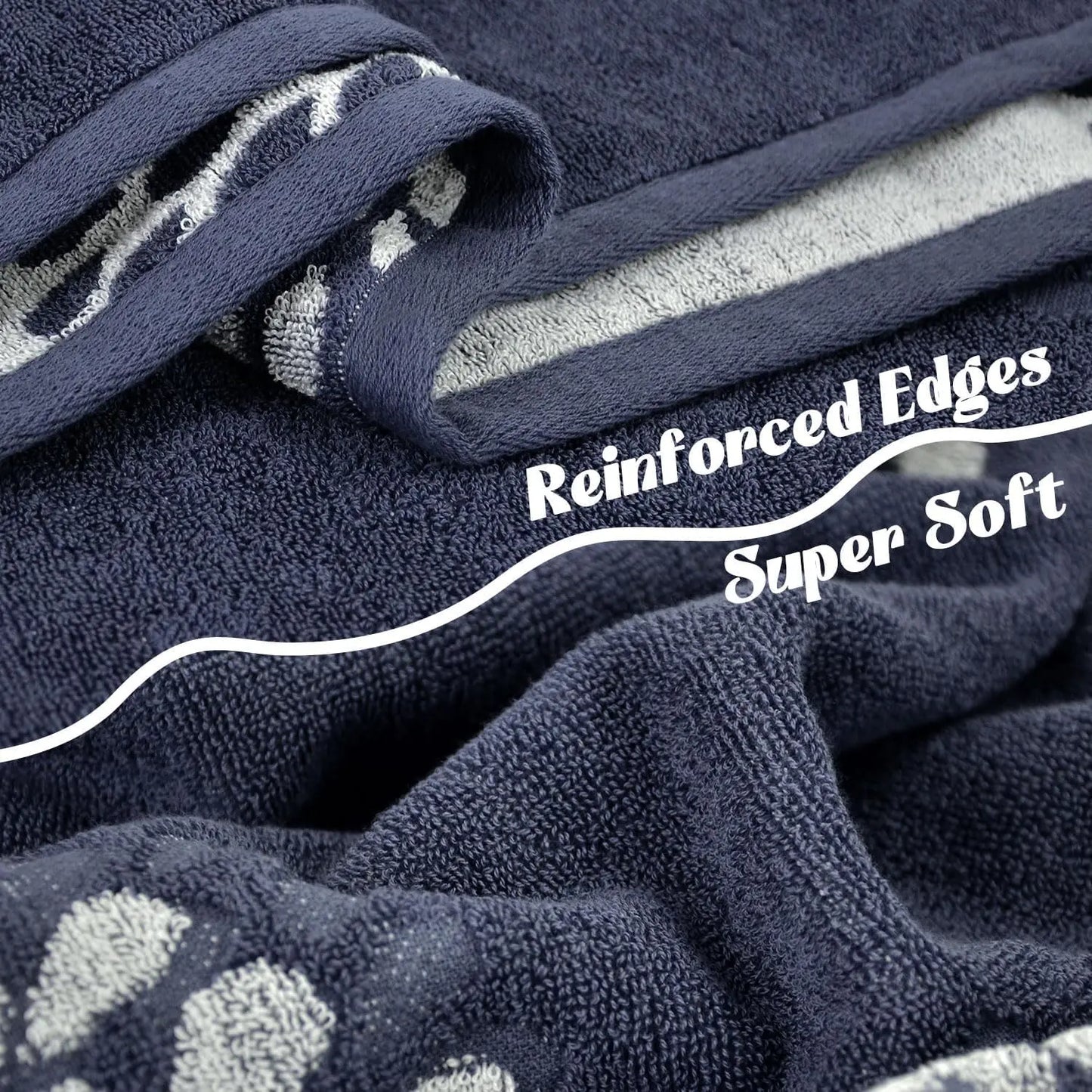 Navy blue towel with gray pattern and text 'Reinforced Edges Super Soft' on a white background