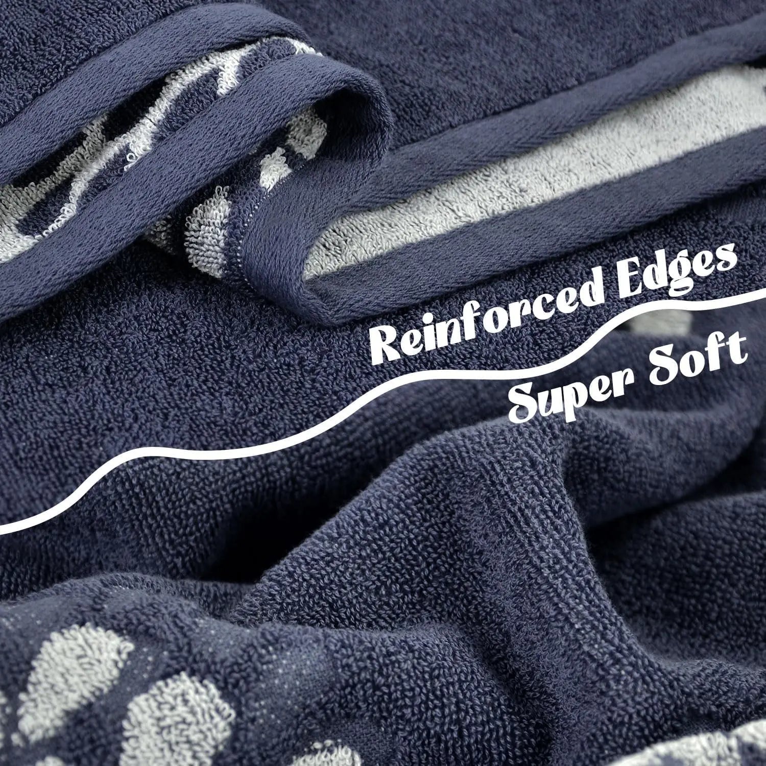 Navy blue towel with gray pattern and text 'Reinforced Edges Super Soft' on a white background
