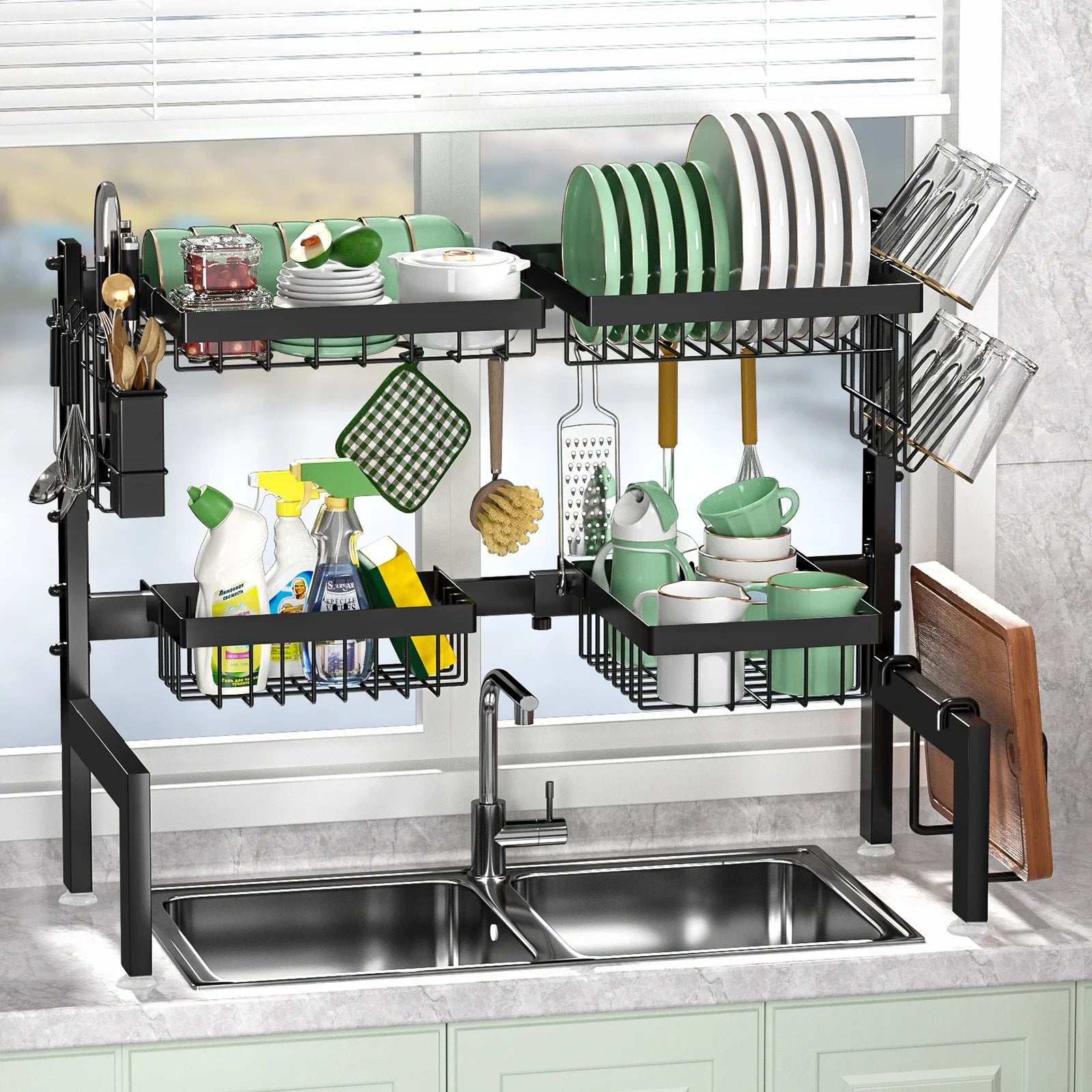 Kitchen dish rack with various utensils and dishes above a sink.