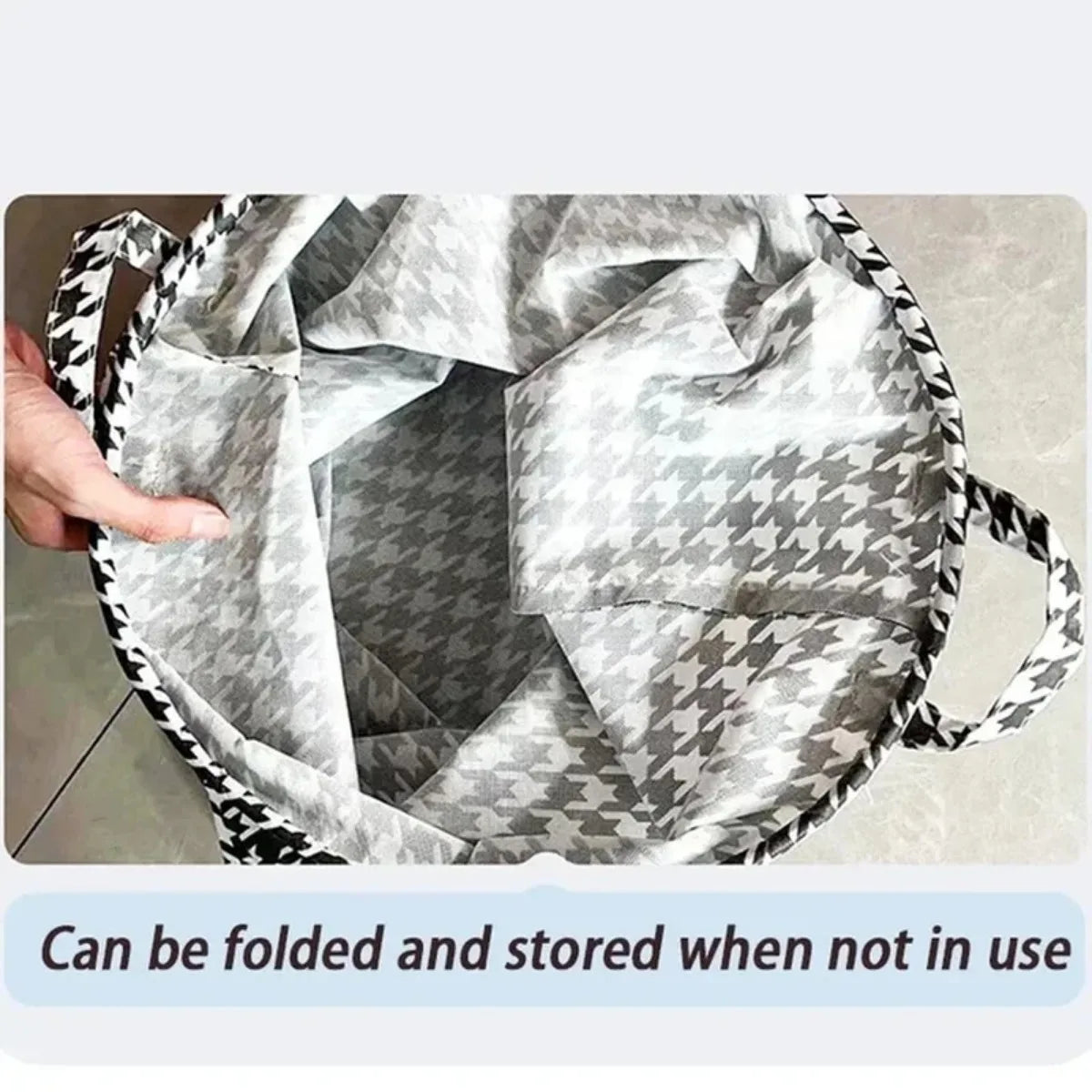 Foldable bag with houndstooth pattern being held open, showing its interior.