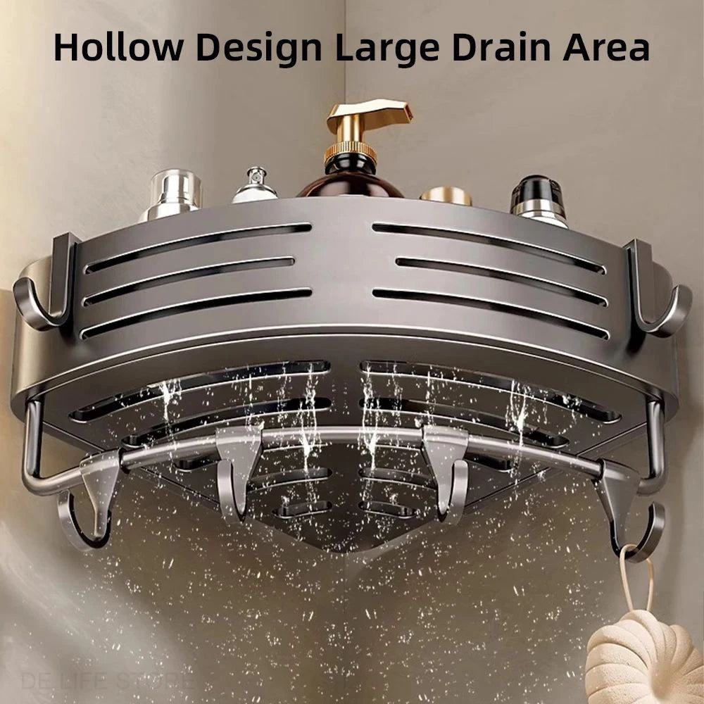 Metal shower head with multiple nozzles and a large drain area on a neutral background.