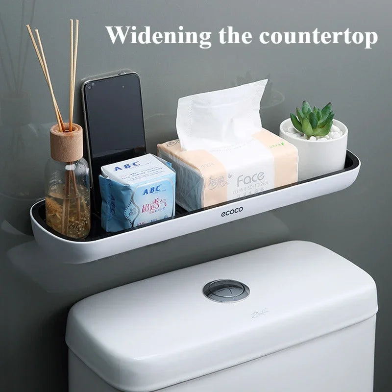 Wall-mounted shelf with toiletries above a toilet, labeled 'Widening the countertop'.