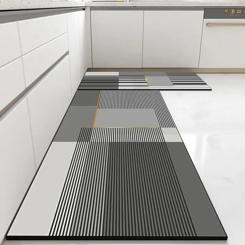 Patterned kitchen mats on a white floor with a modern kitchen setting.