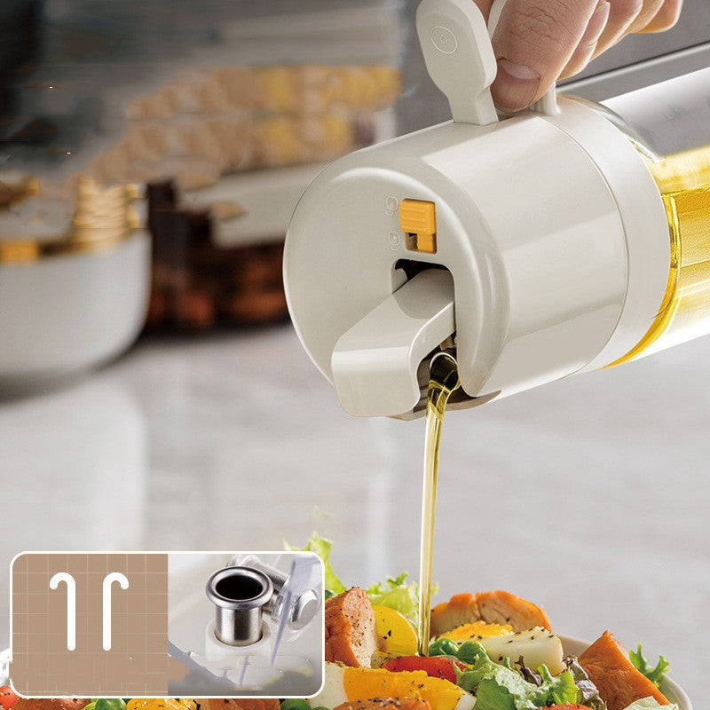 Hand pouring oil from a white and gold oil dispenser onto a salad.